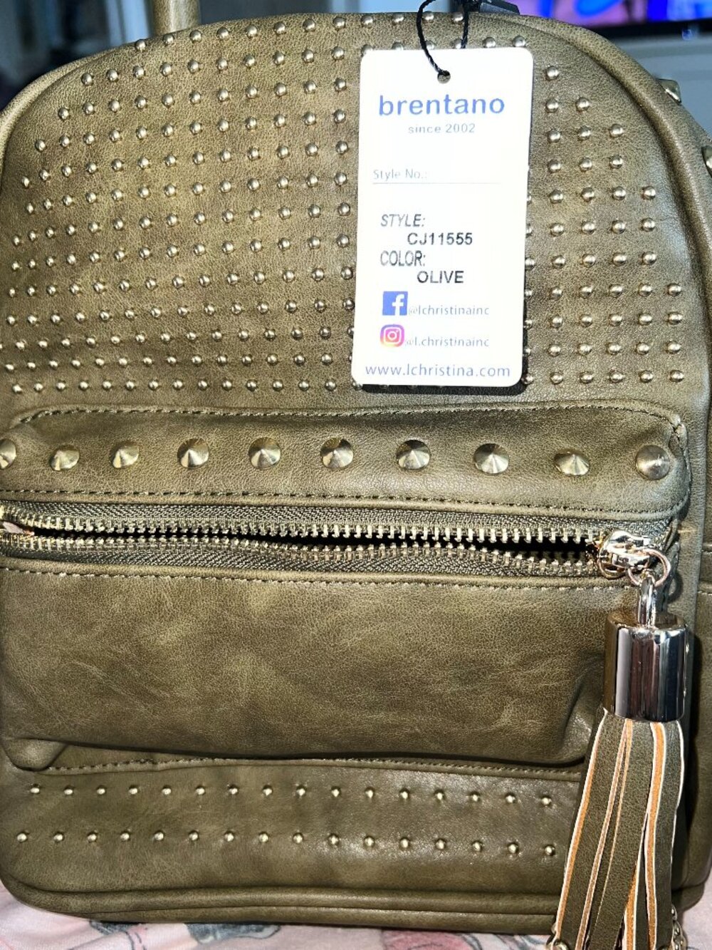 Brentano Studded mini Daypack. New in bag. Asking: $49.